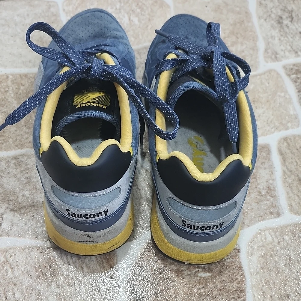 Saucony Blue and Yellow Sneakers Small stains of ink on both tennis in front